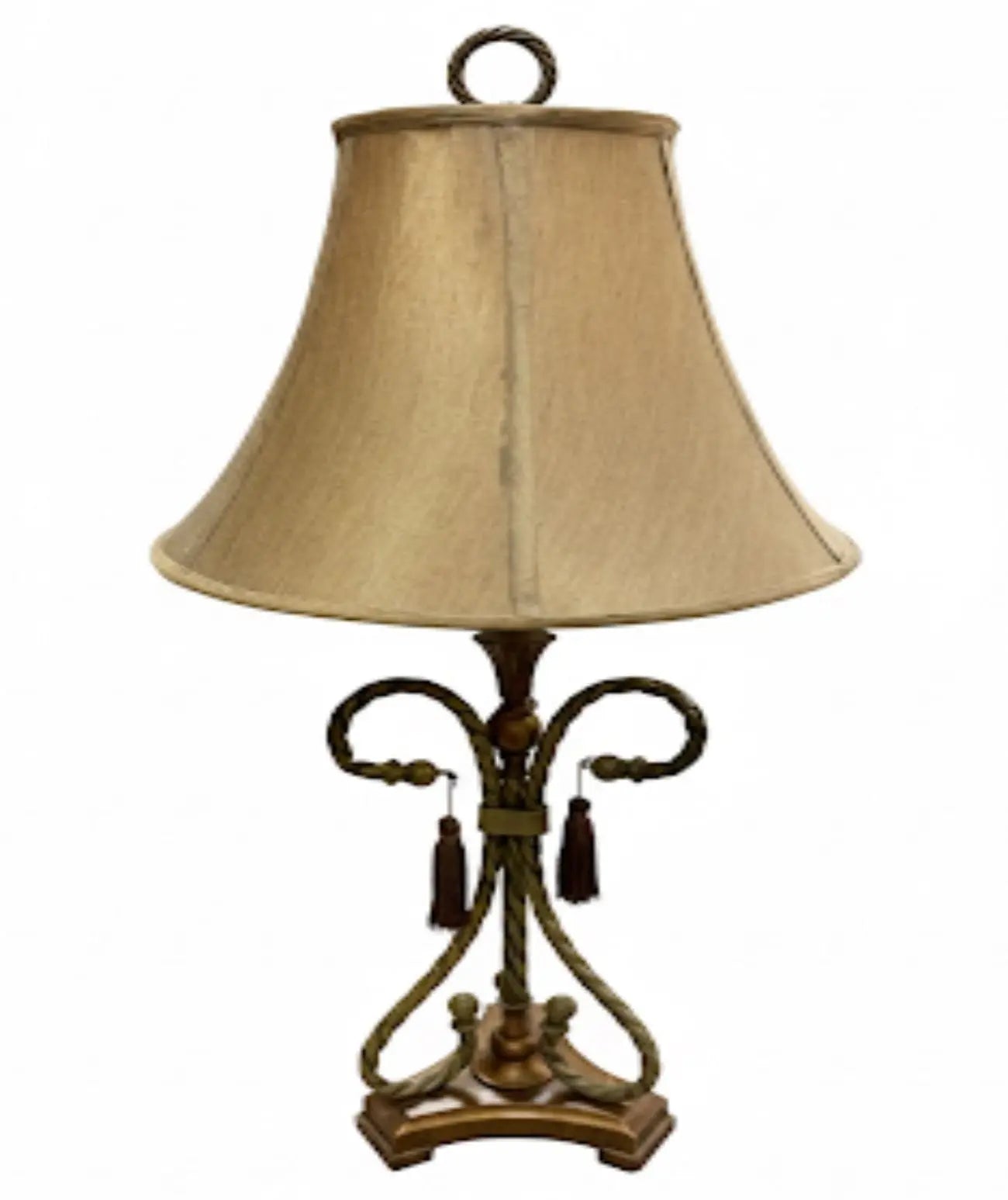Ornate Antique Table Lamp Traditional lamp with a twisted metal base, tassels, and beige fabric shade. Approx. 29' x 19"