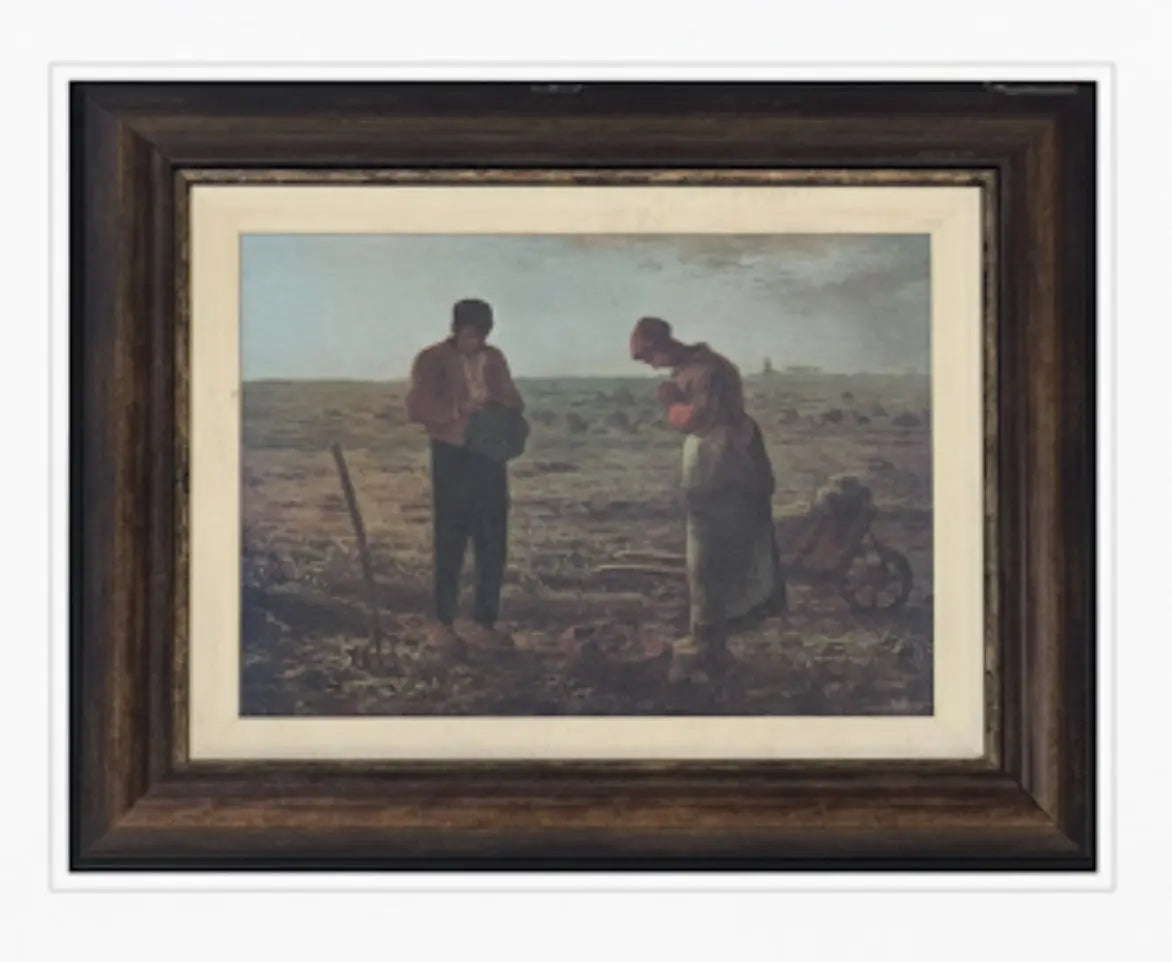 A framed print depcting a Faiois Millet's "The Angel". Approx. 20" x 24"