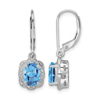 Sterling Silver Rhodium-plated Diamond and Blue Topaz Earrings