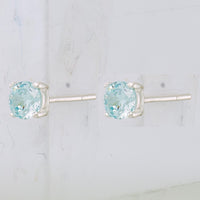 Sterling Silver Polished 4mm Round Light Blue CZ Stud Earrings