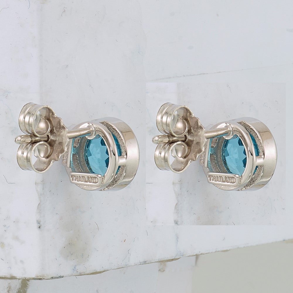 Sterling Silver Rhodium-plated Blue Topaz Circle Stud Earrings