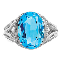 Sterling Silver Rhodium Oval Blue Topaz Ring
