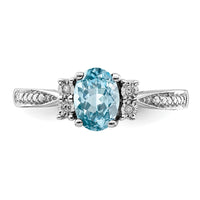 Sterling Silver Rhodium Diam. & Light Blue Topaz Ring