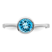 Sterling Silver Rhodium Blue Topaz Ring