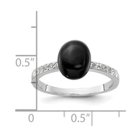 Sterling Silver Rhodium-plated Onyx and .2WT White Topaz Ring