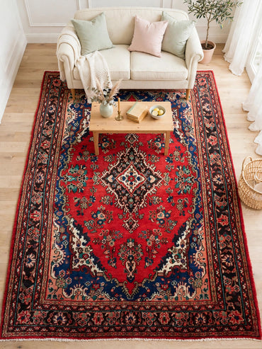 Hand knotted Persian vintage rug, 10 ft 4 in x 6 ft 9 in, in living room
